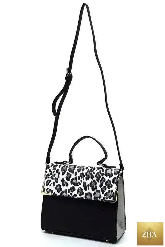 Femstylo vegan leather satchel with top handle and crossbody strap, showing its sleek black design and structured shape.
