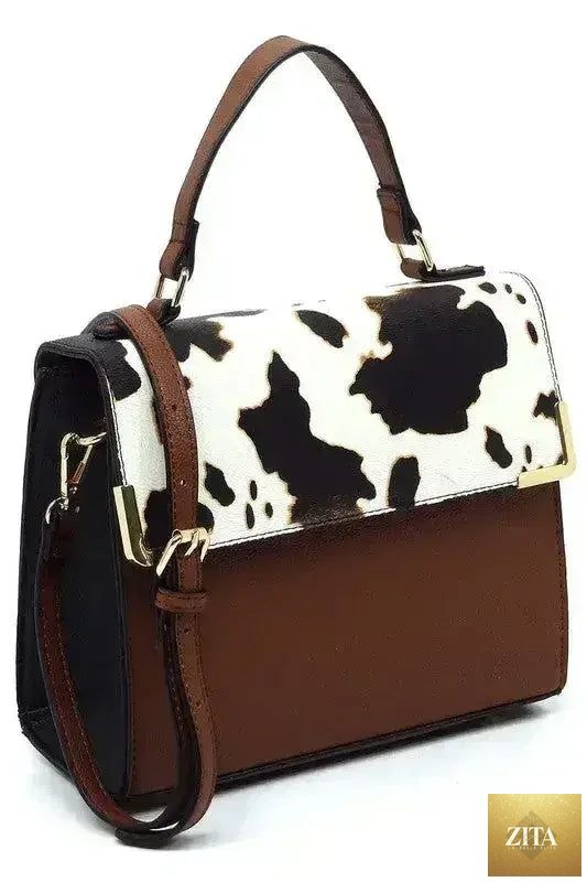 Femstylo vegan leather satchel with top handle and crossbody strap, stylish bag for everyday use, in black with gold accents.