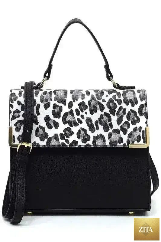 Femstylo vegan leather satchel bag with top handle and crossbody strap, showcasing its sleek, stylish design and durable material.