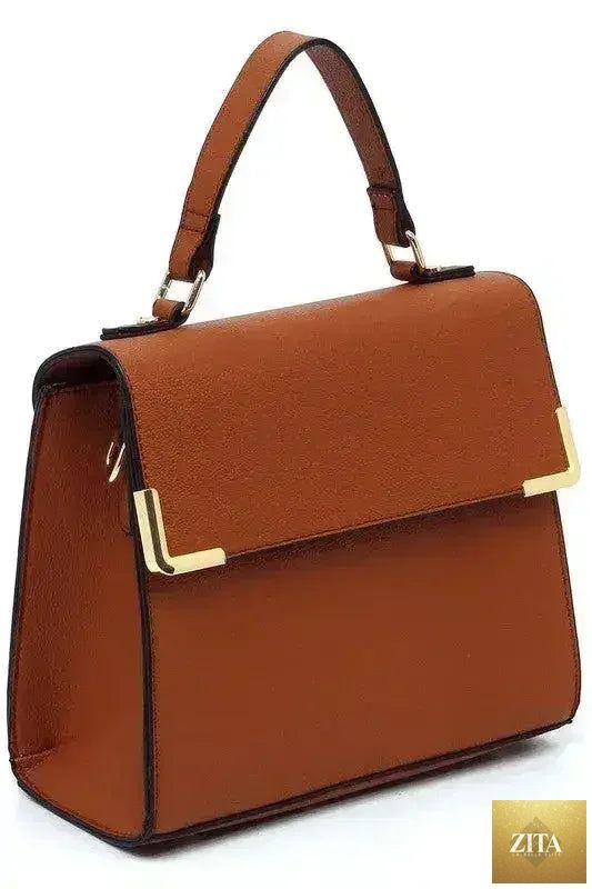 Femstylo vegan leather satchel with top handle and crossbody strap, showcasing a stylish, structured bag in neutral tones.