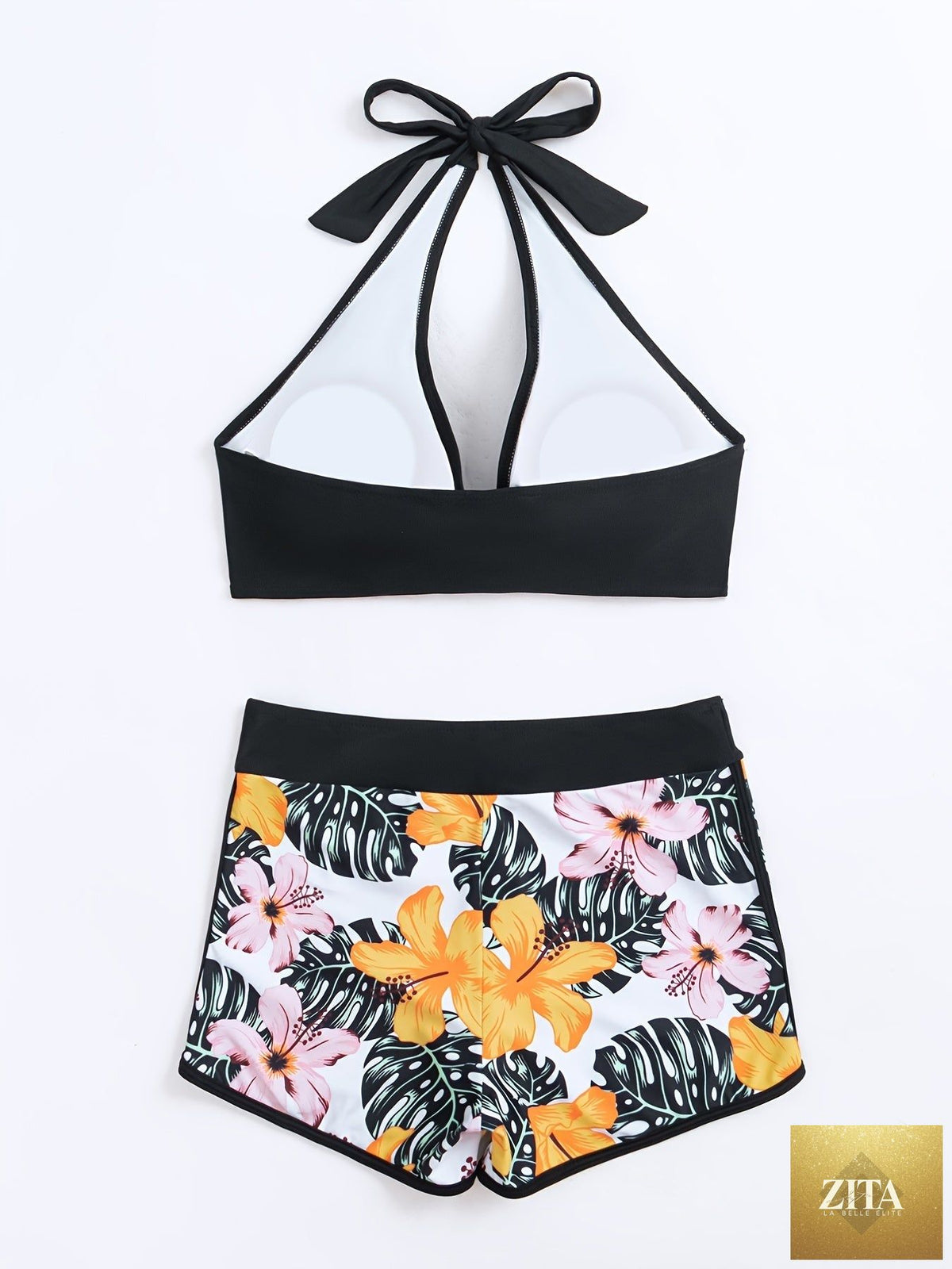 Stevvex floral bikini set with halter neck, backless design, tie-neck bow, and high waist shorts, perfect for beach and poolside summer.