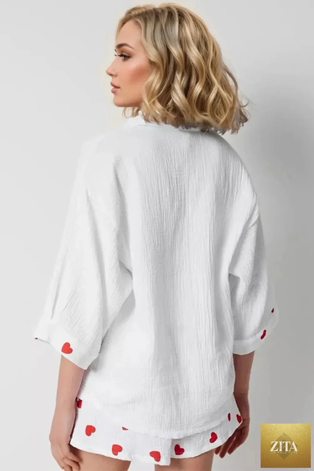 Basic Bae heart collared neck button down top and shorts set, featuring a heart pattern and casual summer style.