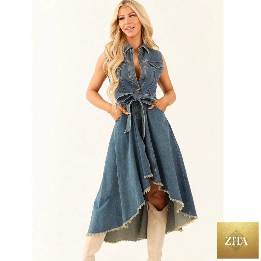 Women's sleeveless denim midi dress with irregular hem and button-front detail by FitiqueFit, styled for casual summer wear.