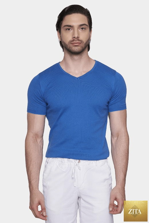 Marine blue Bright Moons Essential Shirt displayed hanging on a wooden hanger, showcasing its casual fit and soft fabric.