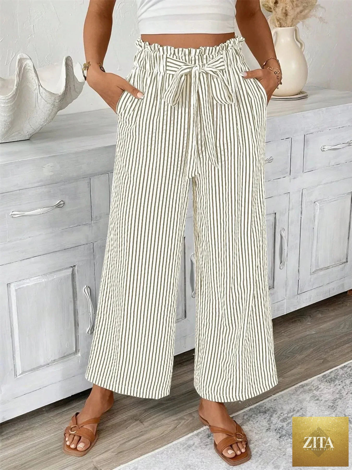Plus size striped wide leg paper bag pants by SITRA, featuring a full length design with a fashionable relaxed fit