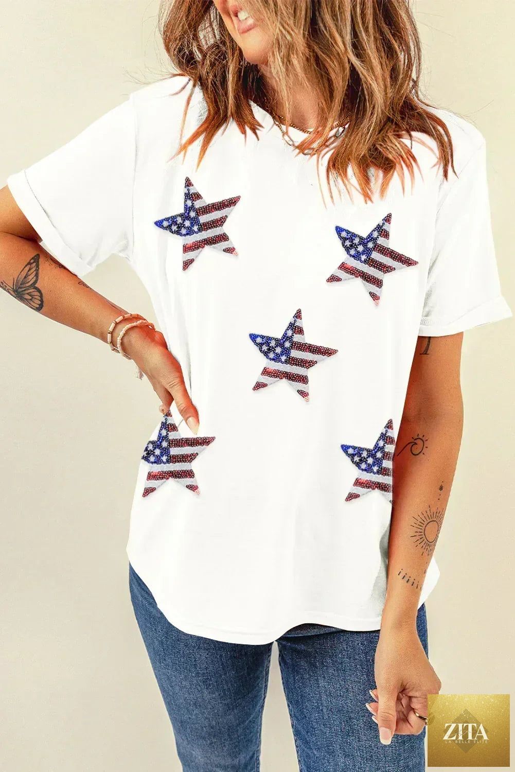 Black sequined American flag star graphic T-shirt by Femstylo, featuring bold star design and glittering sequins on soft fabric.