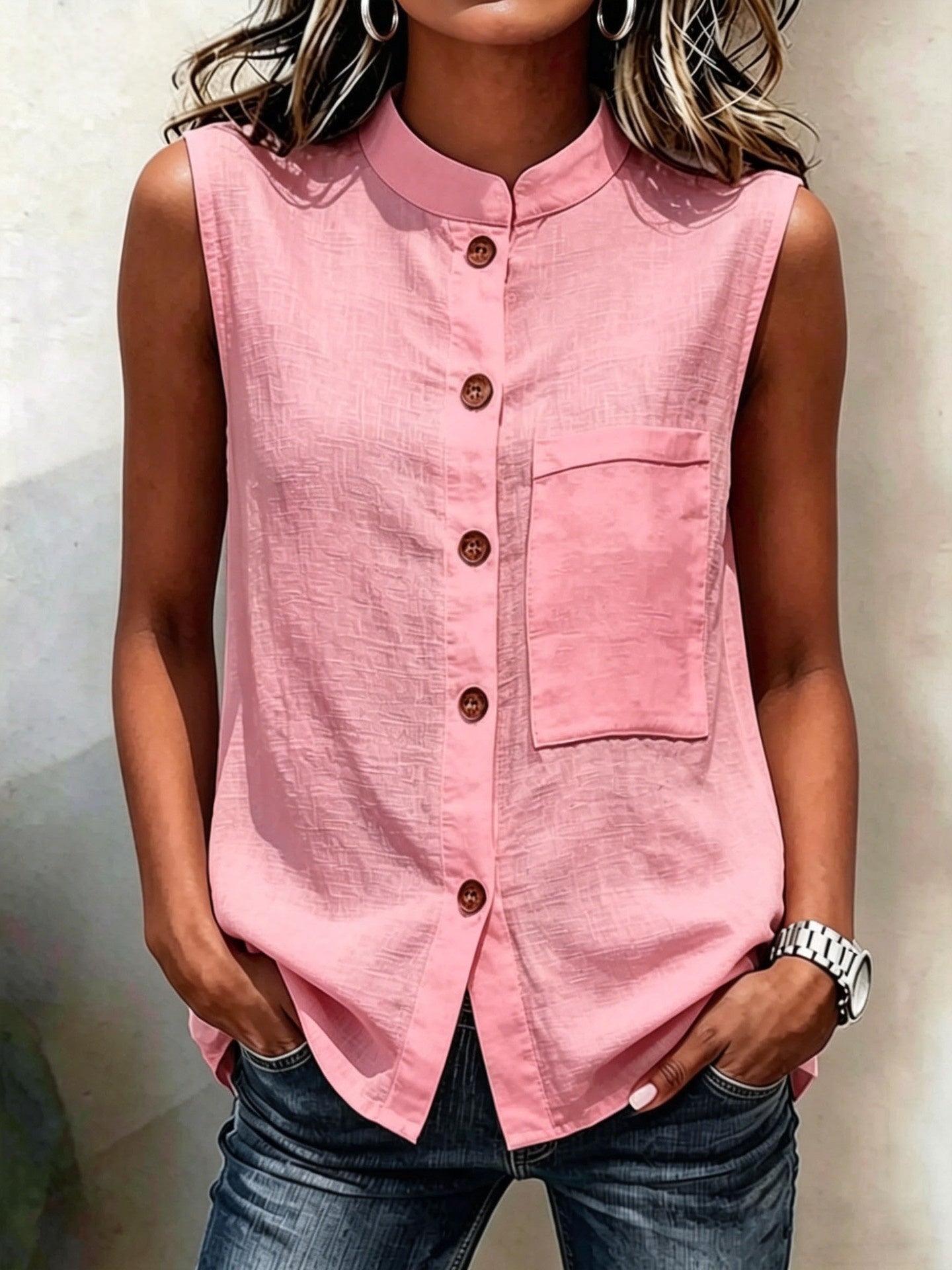 Women's sleeveless crop top by FitiqueFit featuring buttoned pockets and a solid color, perfect for casualwear.