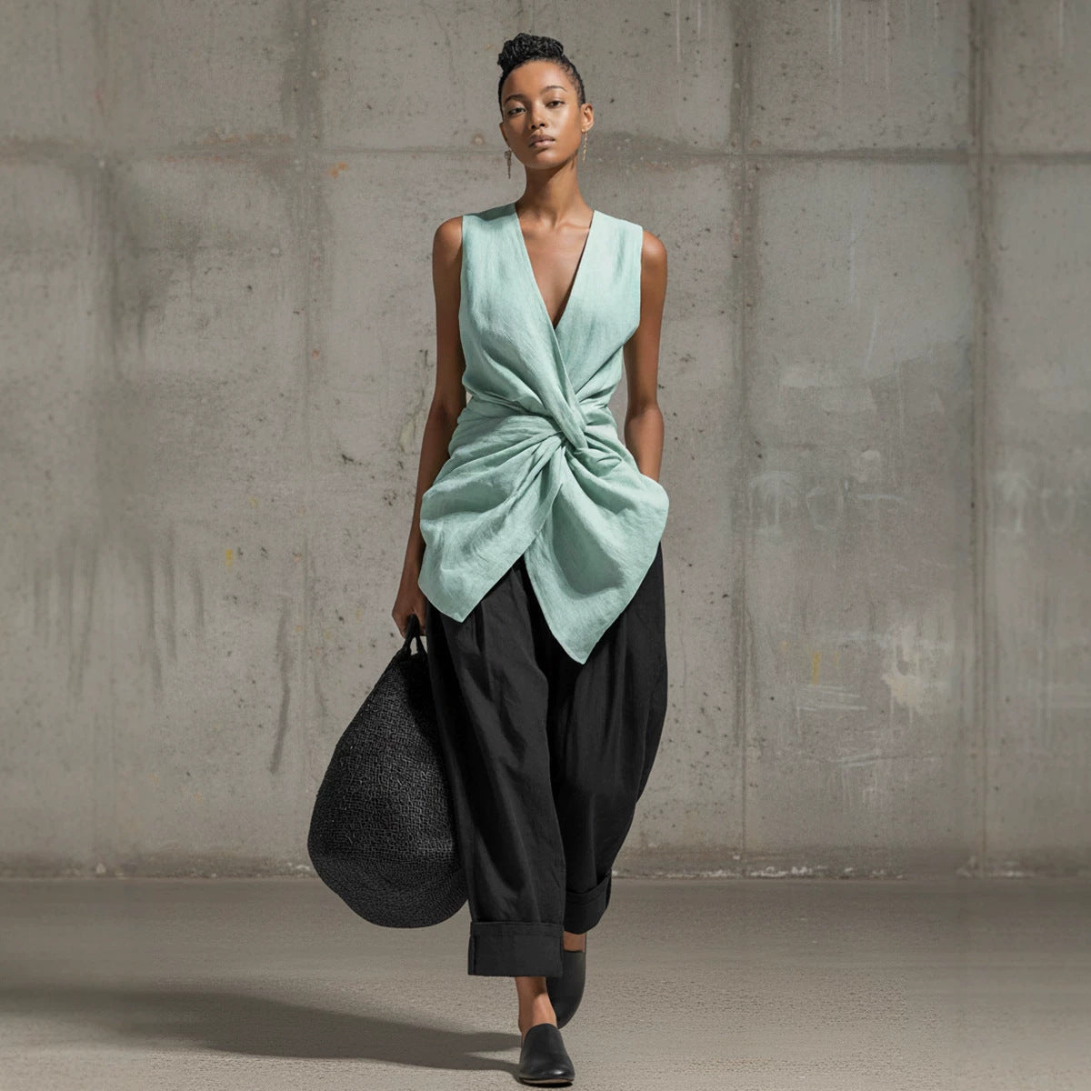 Women's casual tie-front V-neck sleeveless top and wide-leg pants set by FitiqueFit, shown in a stylish, relaxed fit.