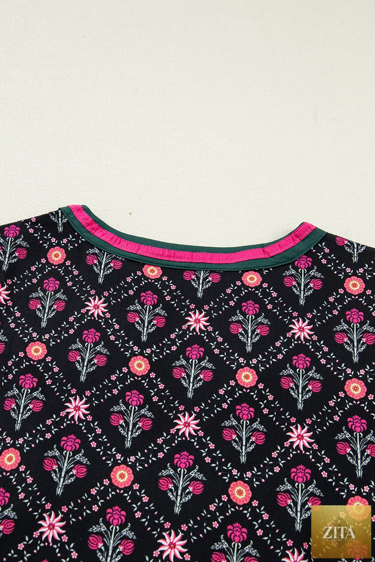 Black vintage floral blouse with contrast v-neckline and bracelet sleeves, stylish top from Wild and Free Boutique.