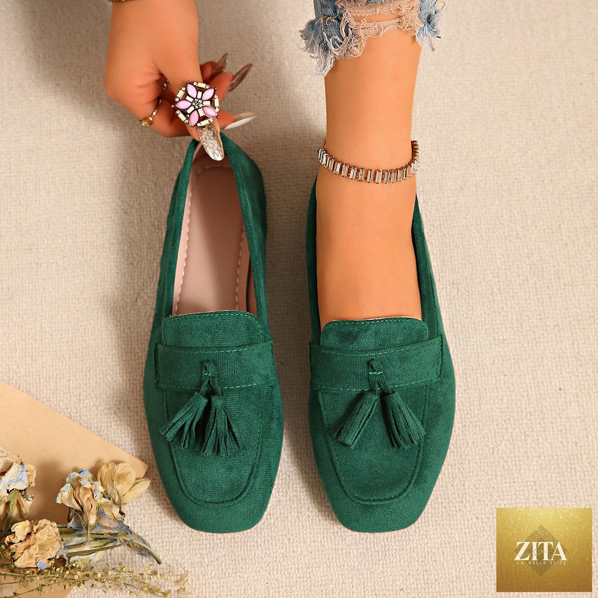Women's suede square toe tassel slip-on loafers by FitiqueFit, featuring a casual flat design with tassel details.
