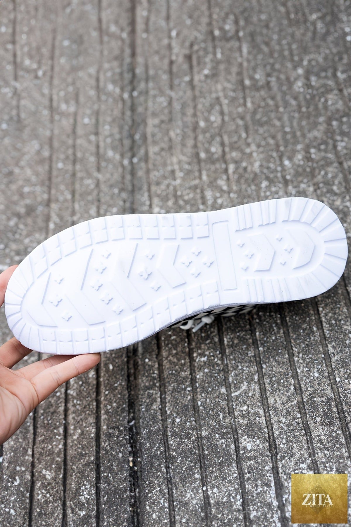 Black checkered print lace-up flat shoes for women by Wild and Free Boutique, featuring a stylish checked pattern and comfortable design.