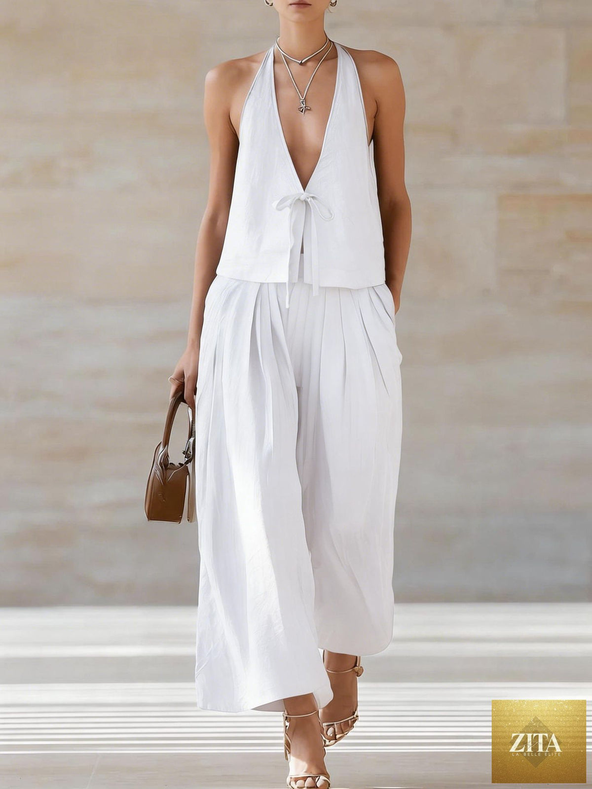 Women's sleeveless vest and wide-leg pants set by Zita La Belle Elite, casual lace-up two-piece outfit, stylish and comfortable.