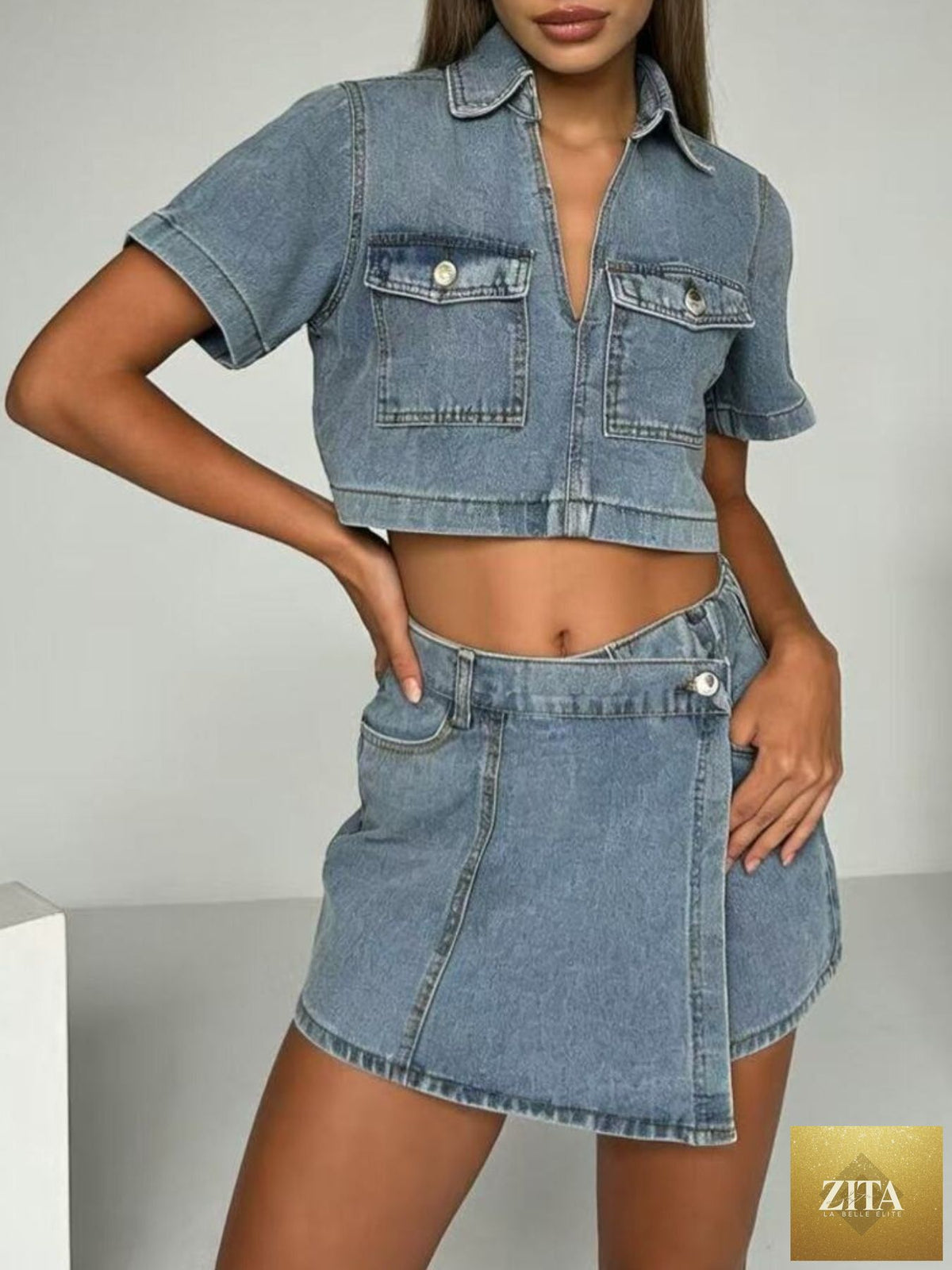 Wild and Free Boutique denim short sleeve cropped top and matching skort set, casual and trendy summer outfit for women.