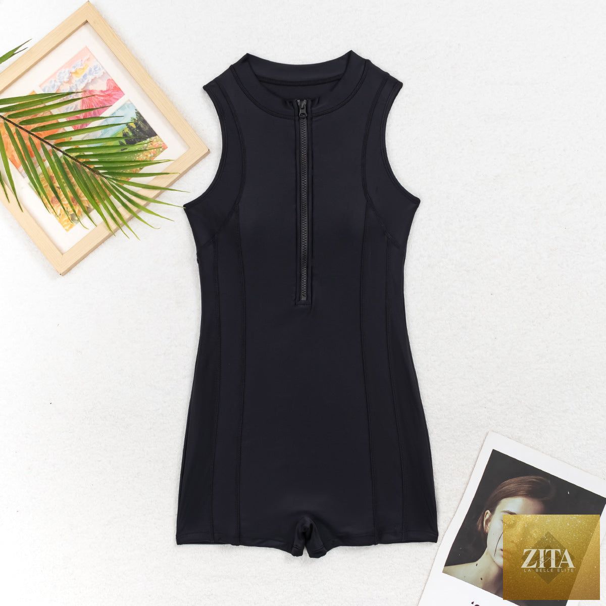 Women's sleeveless athletic one-piece swimsuit by Zita La Belle Elite featuring a zip-up front and high-waist design.