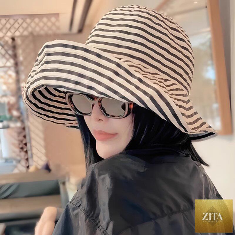 Women's wide-brim striped sun hat by Zita La Belle Elite with UV protection and adjustable fit, featuring a stylish, breathable design.