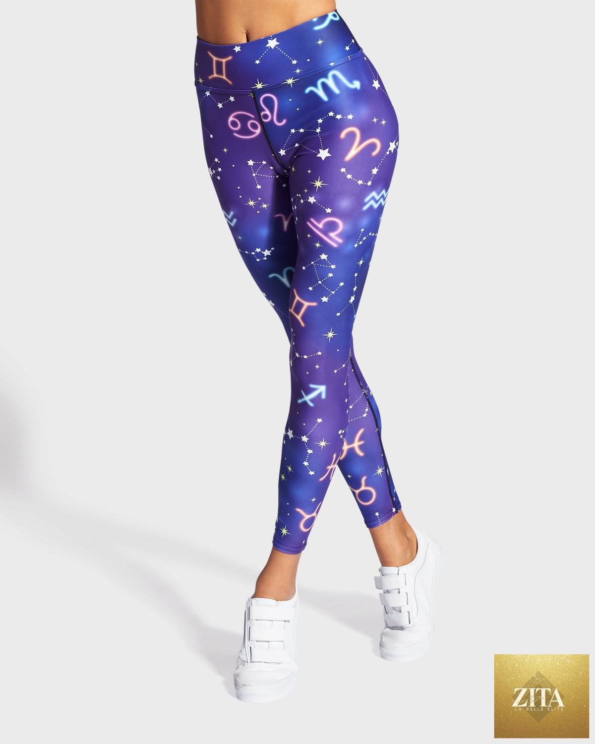 Zodiac Drip Yoga Leggings by RUFFHAUS NYC featuring vibrant, colorful zodiac-inspired drip pattern on stretchy fabric