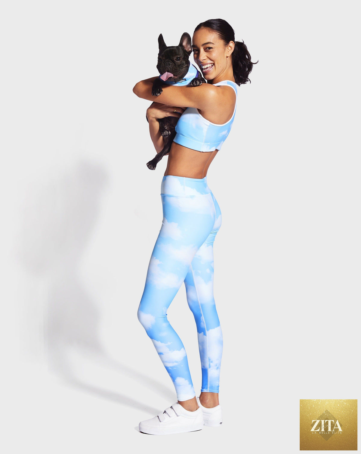 Blue Skies yoga leggings by RUFFHAUS NYC, featuring a vibrant blue color and comfortable fit, shown laid flat on a white background.