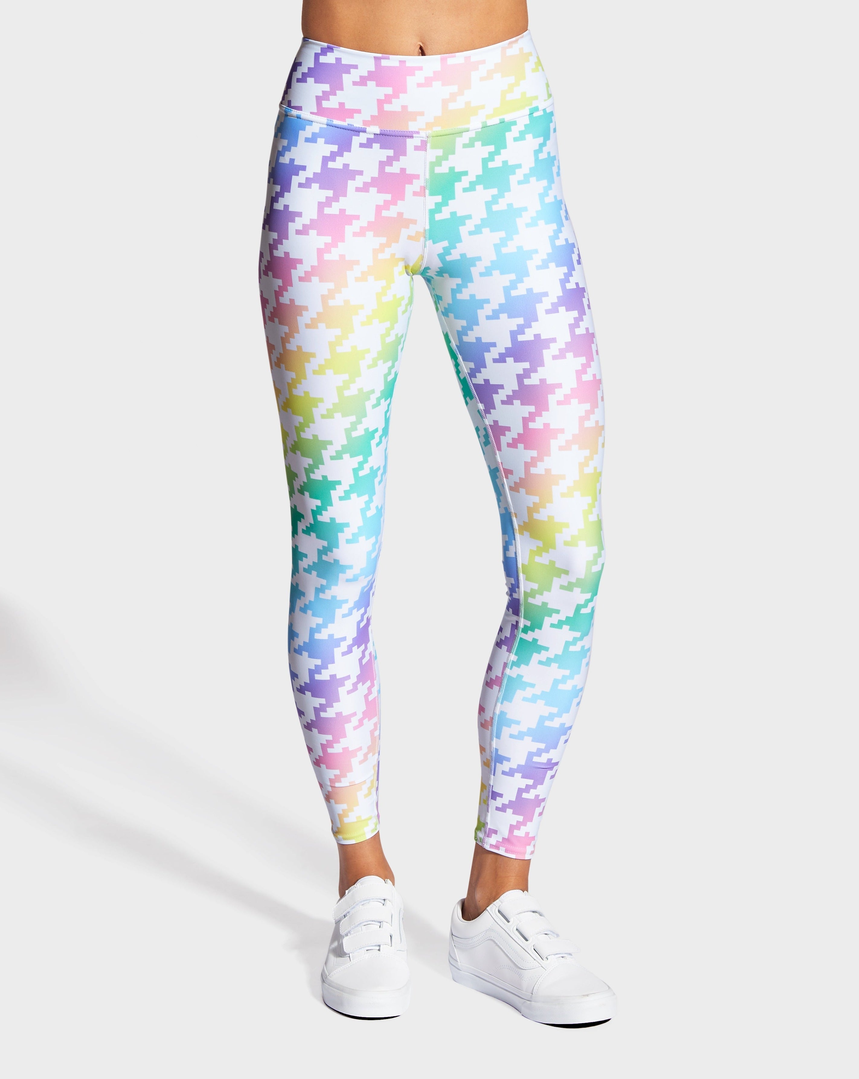 Rainbowtooth yoga leggings by RUFFHAUS NYC featuring vibrant rainbow tooth pattern and comfortable fit for active wear.