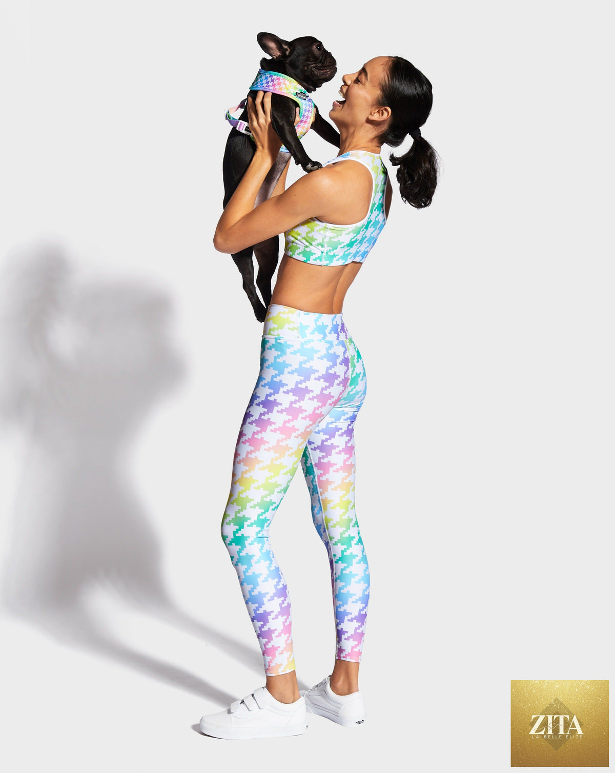 Rainbowtooth yoga leggings by RUFFHAUS NYC featuring vibrant rainbow tooth pattern and stretchy, comfortable fabric for active wear.