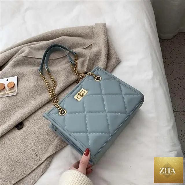 Elegant Stevvex leather shoulder handbag with quilted design, ideal for women’s travel and fashion, showcasing a luxurious, trendy look.