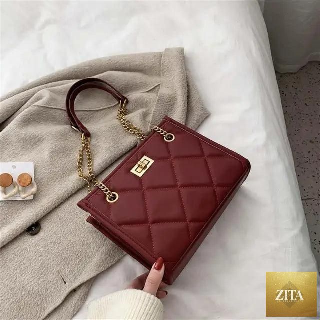 Elegant genuine leather shoulder bag by Stevvex with quilted design, perfect for women’s travel and stylish everyday use.