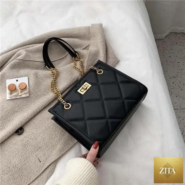 Elegant genuine leather shoulder handbag by Stevvex featuring quilted design, ideal for travel and stylish women.