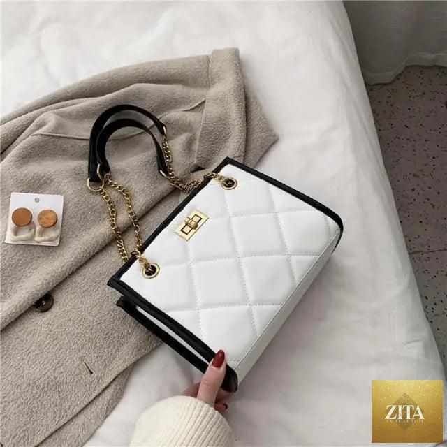 Elegant genuine leather Stevvex shoulder bag for women, featuring quilted design and trendy style, perfect for travel and everyday use.