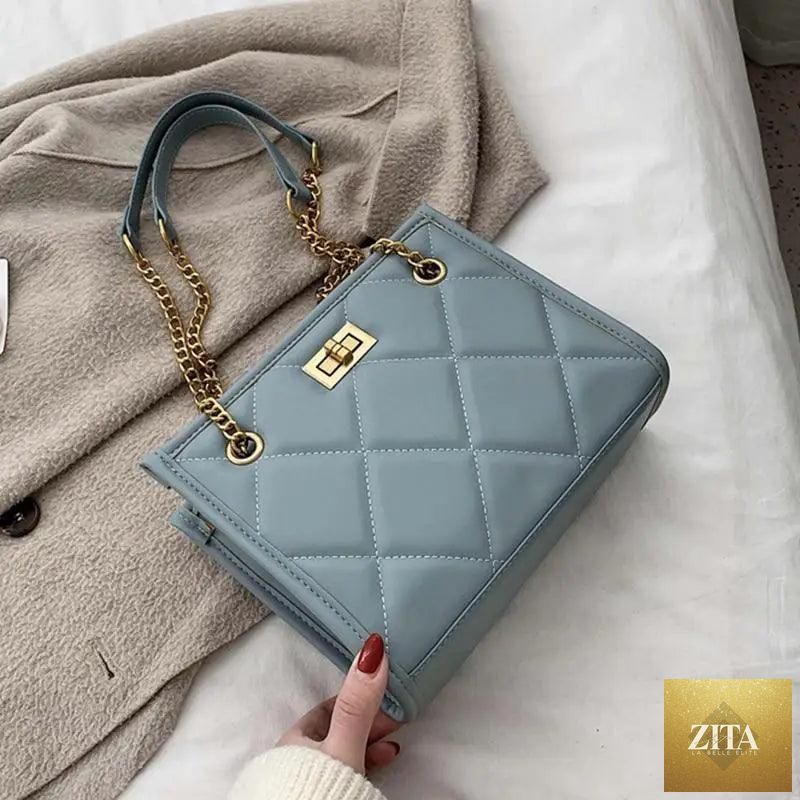 Elegant genuine leather Stevvex shoulder handbag with quilted design, perfect for women’s travel and fashion occasions.