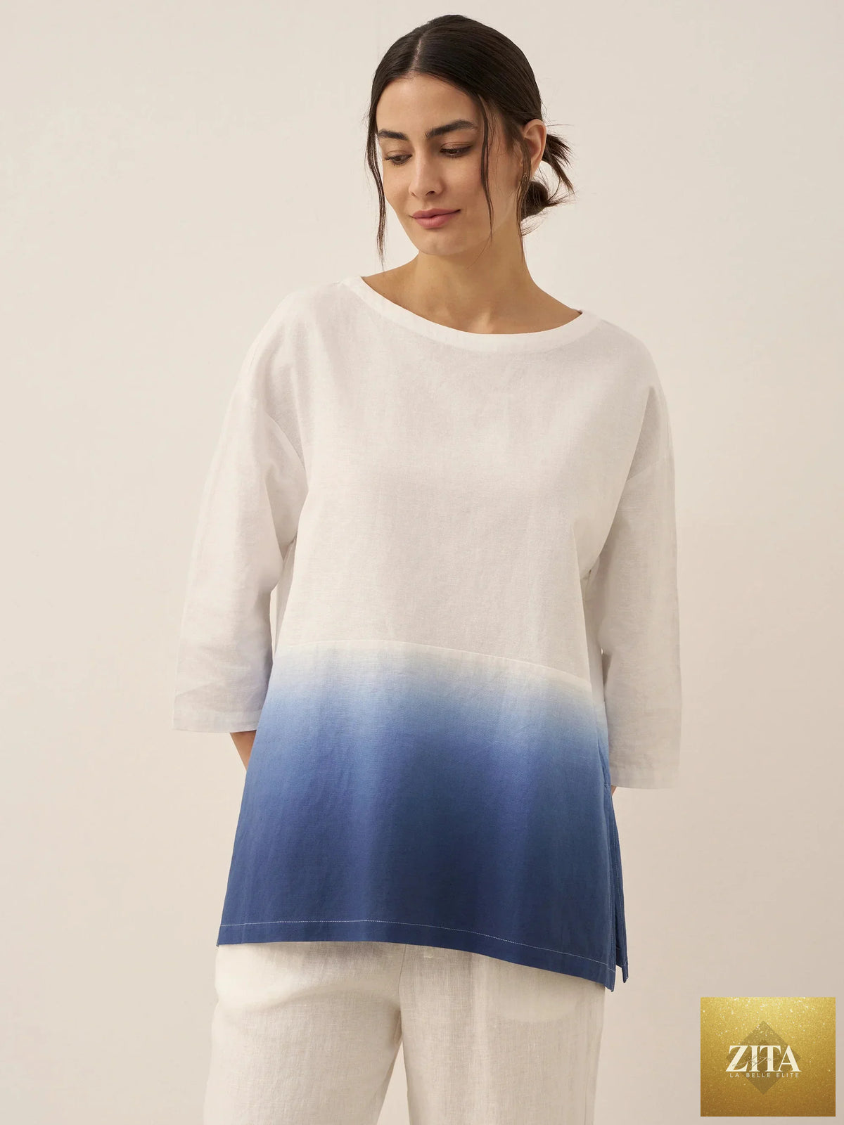LINTICO Linen White Boat Neck Oversized Top with relaxed fit, long sleeves, and breathable linen blend fabric.