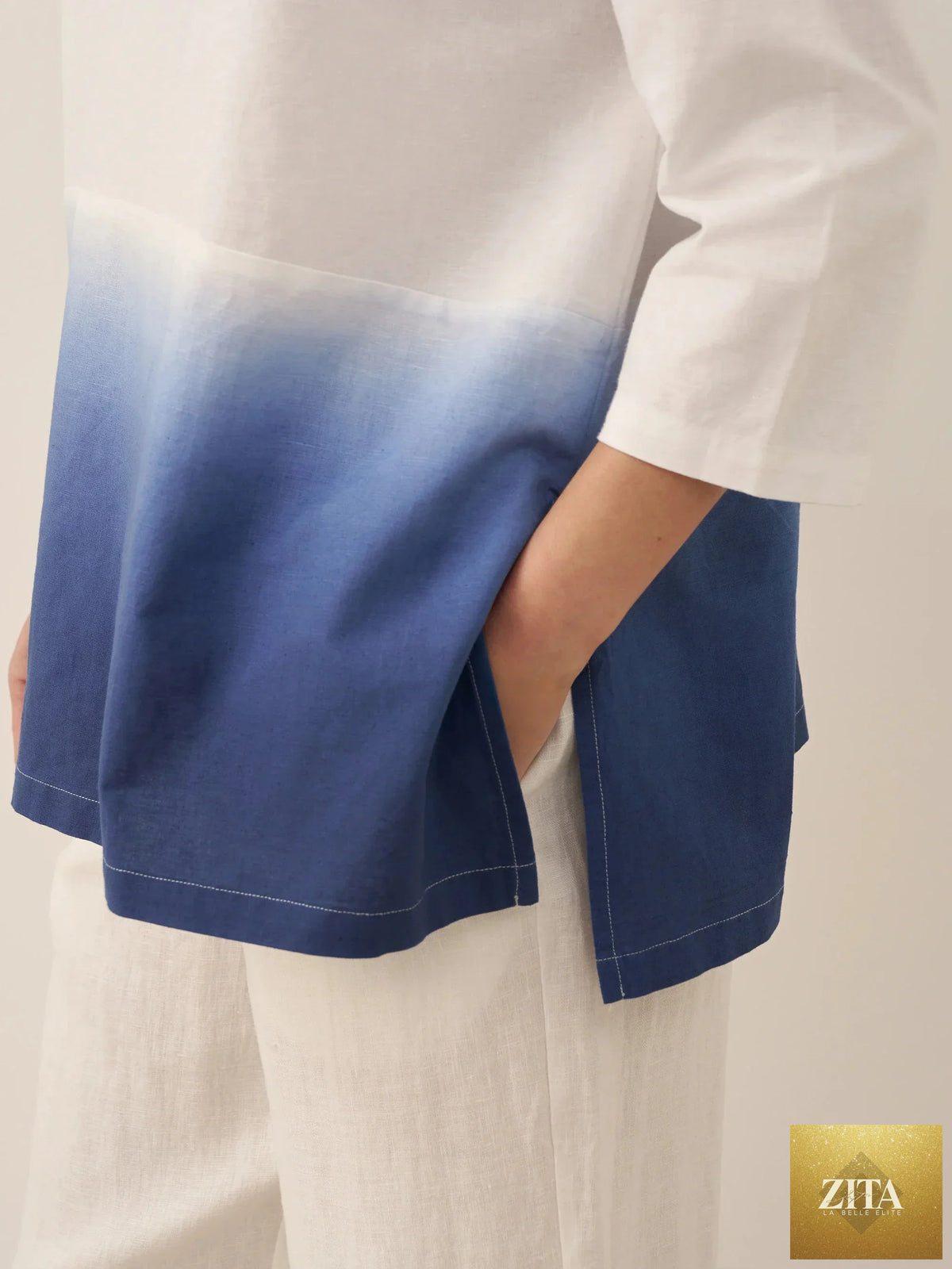 LINTICO linen white boat neck oversized blouse with relaxed fit, long sleeves, and lightweight linen blend fabric.