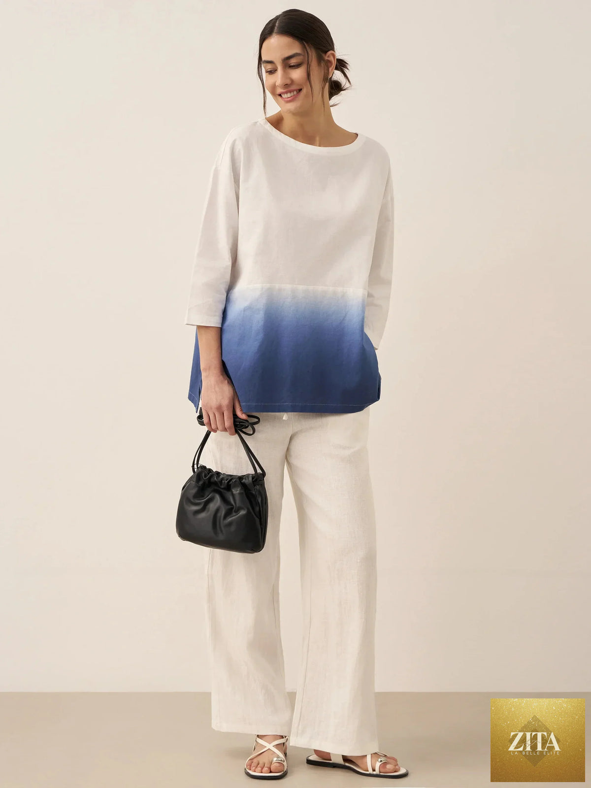 LINTICO Linen White Boat Neck Oversized Top, casual blouse made of linen blend fabric with a relaxed fit and boat neckline.