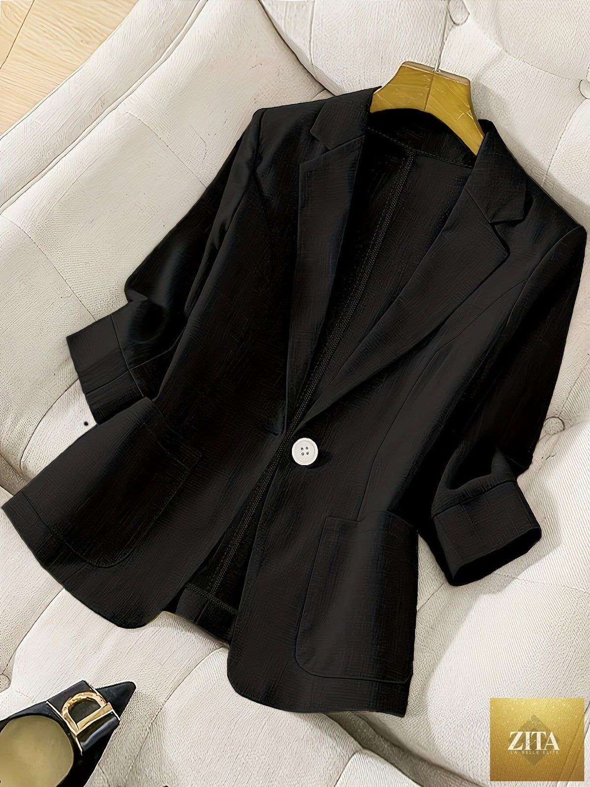 Women's casual blazer with three-quarter sleeves and single button, by Zita La Belle Elite, shown in a stylish coat style.