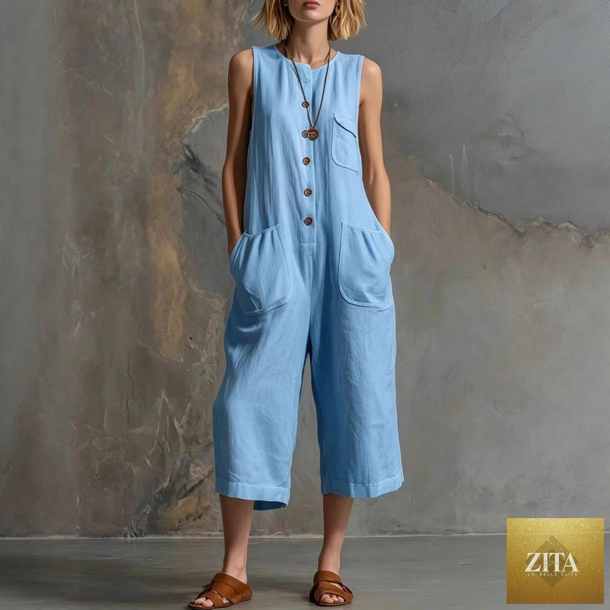 Retro sleeveless cotton-linen wide-leg cropped jumpsuit, beige color, with a relaxed fit and wide leg design.