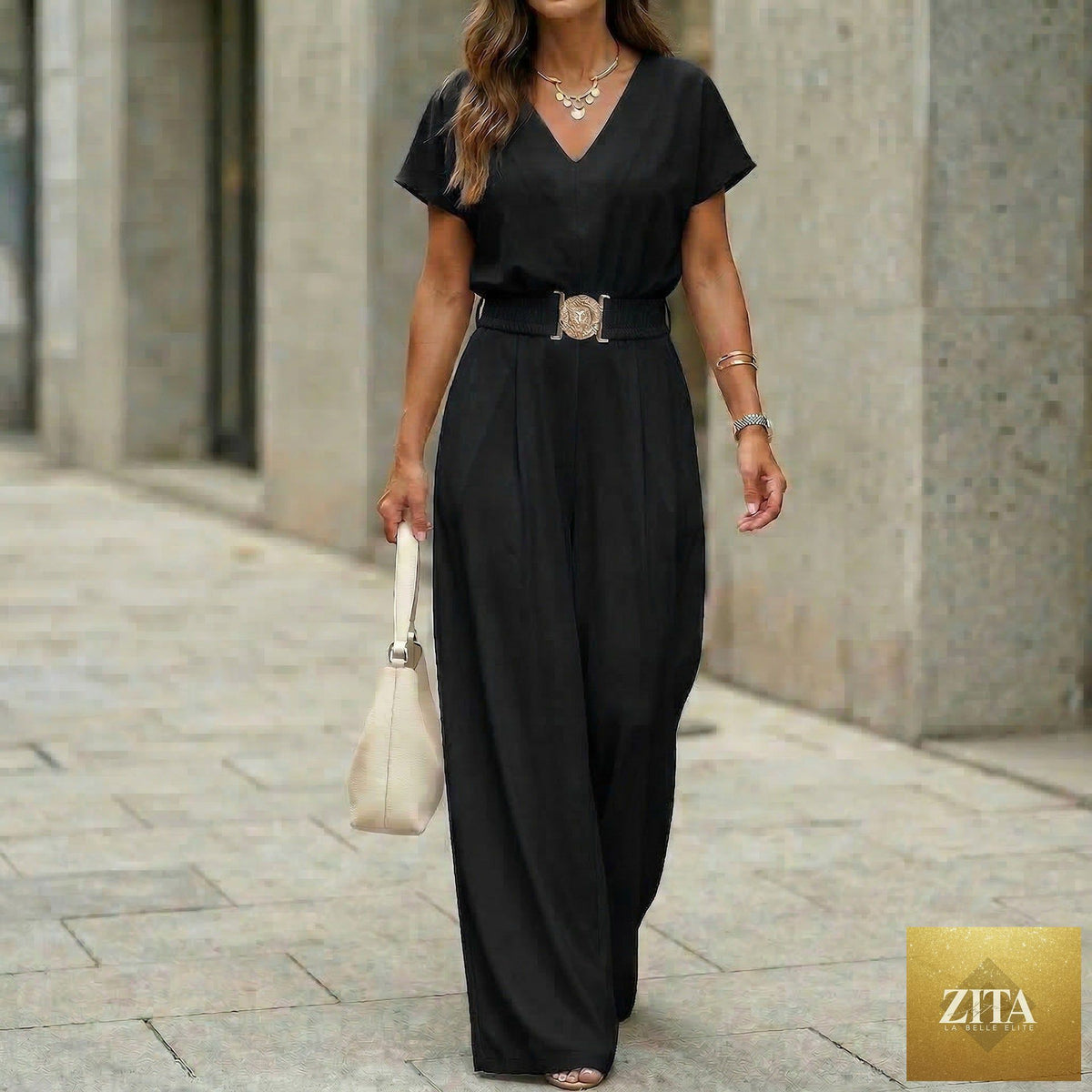 Women's V-neck belted wide-leg jumpsuit in casualwear style, featuring a flattering fit and comfortable design by FitiqueFit.