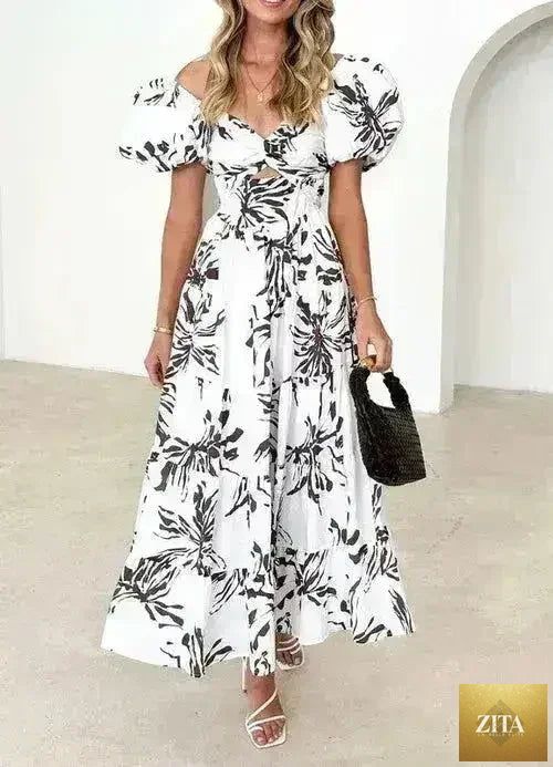Femstylo women's puff sleeve maxi dress with romantic flowy fabric and elegant design, perfect for stylish occasions.