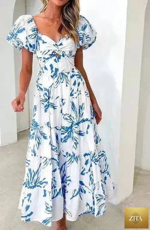 Femstylo women's puff sleeve maxi dress with a romantic, flowy silhouette, featuring elegant puffed sleeves and a long, flowing skirt.