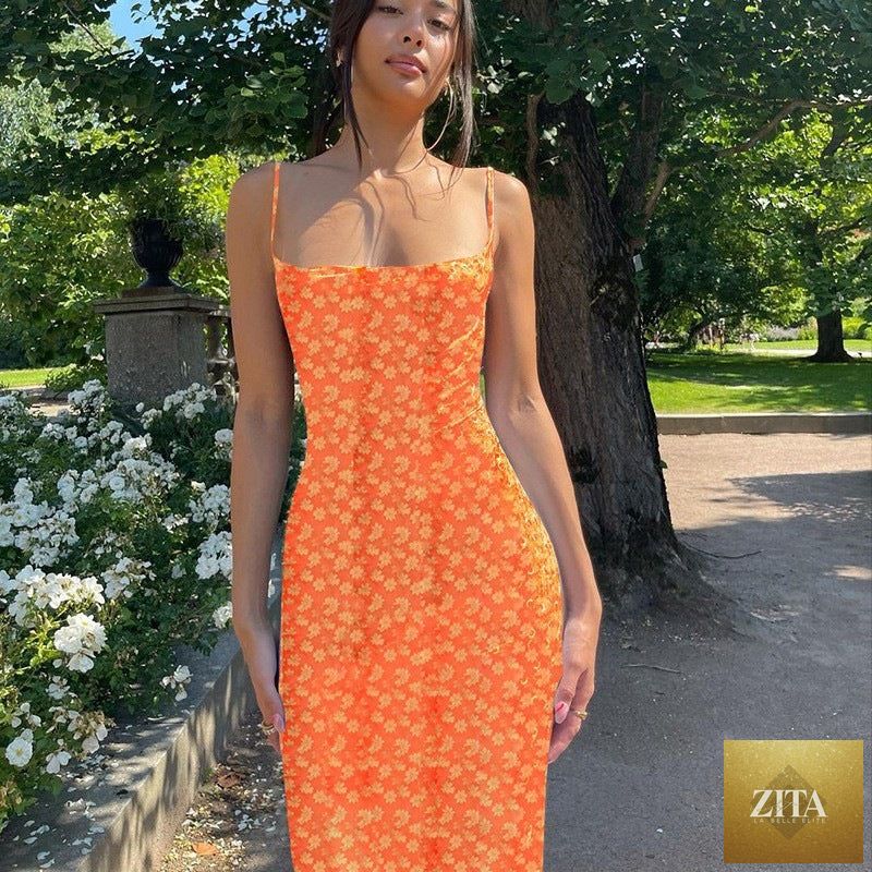 Women's slim fit printed backless dress by Zita La Belle Elite, casualwear with a stylish backless design and vibrant pattern.