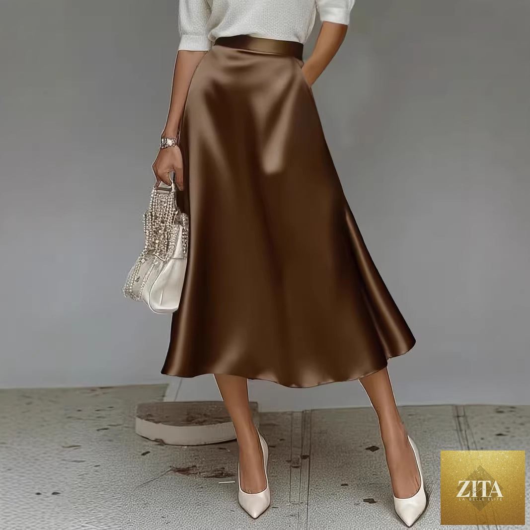 Women's satin solid color mid-length skirt by Zita La Belle Elite, featuring slight stretch and smooth fabric in a sleek design.