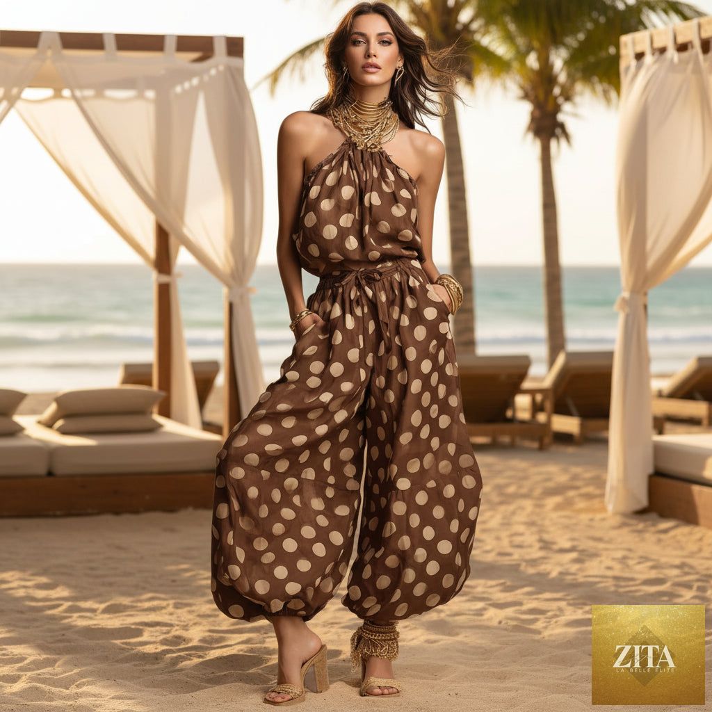Women's polka dot halter neck wide-leg jumpsuit by FitiqueFit, perfect for boho beach vacation, featuring a stylish relaxed fit.