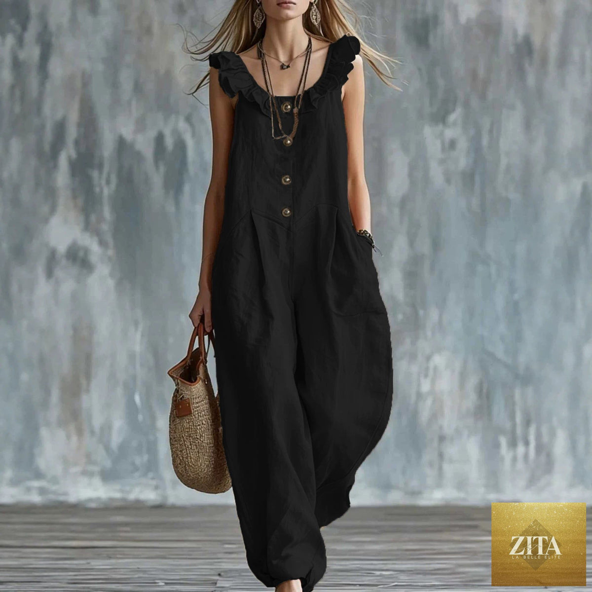 Women’s sleeveless button-down tank jumpsuit by FitiqueFit, casualwear with a fitted waist and relaxed fit, shown on a model.