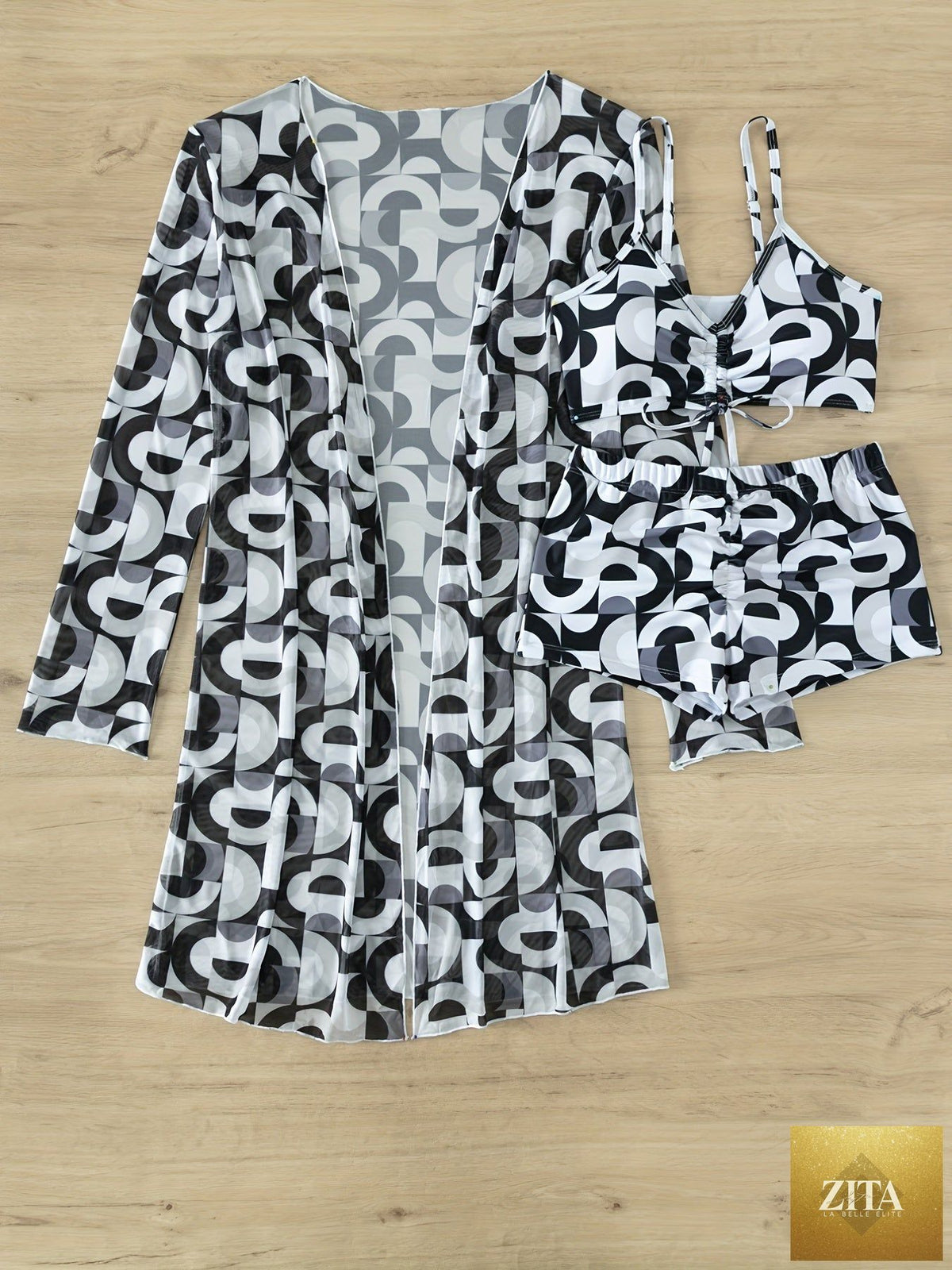 Stevvex Modern Geo 3-Piece Bikini Set with vibrant geometric print, V-neck top, boxer shorts bottoms, and long sleeve cover shirt.
