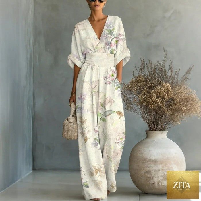 Women's waist-cinched V-neck printed wide-leg jumpsuit by Zita La Belle Elite, featuring a casual style with a flattering fit.