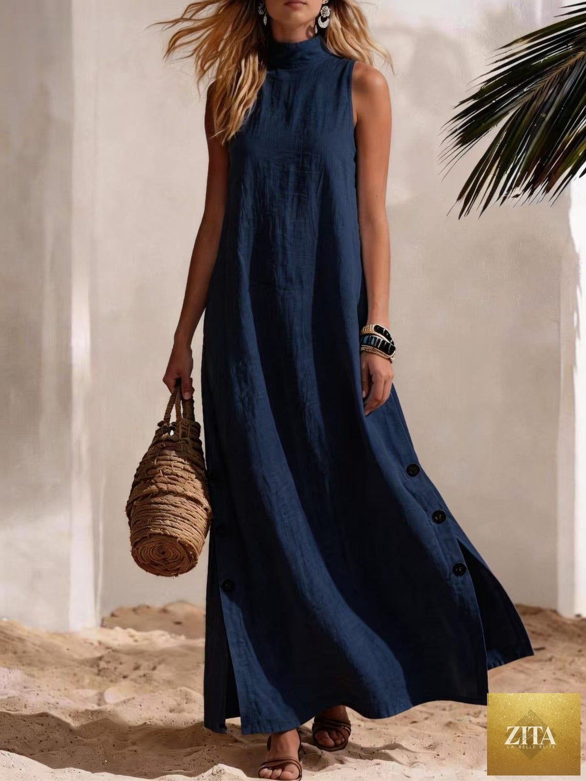 Cotton linen sleeveless midi dress with side slits and loose fit by FitiqueFit, displayed on a hanger against a neutral background.