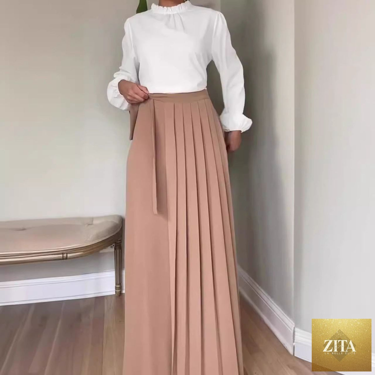 Women's solid-color wide-leg pleated pants with ties, featuring a relaxed fit and stylish design, perfect for casual or office wear.