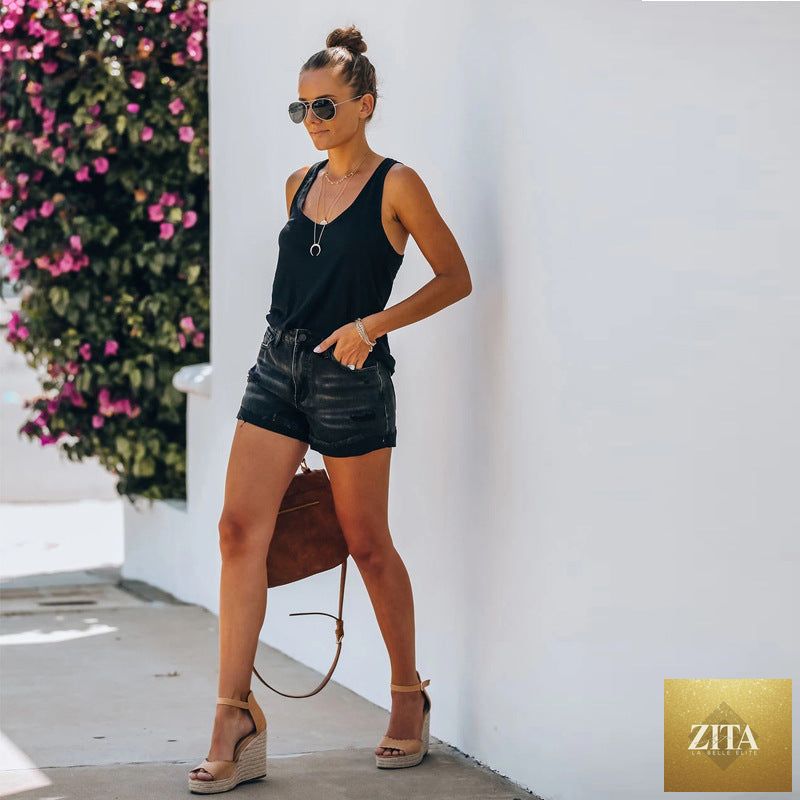 High elastic black spring and summer high waist denim jeans for women, featuring trendy hot pants from Wanita Store.