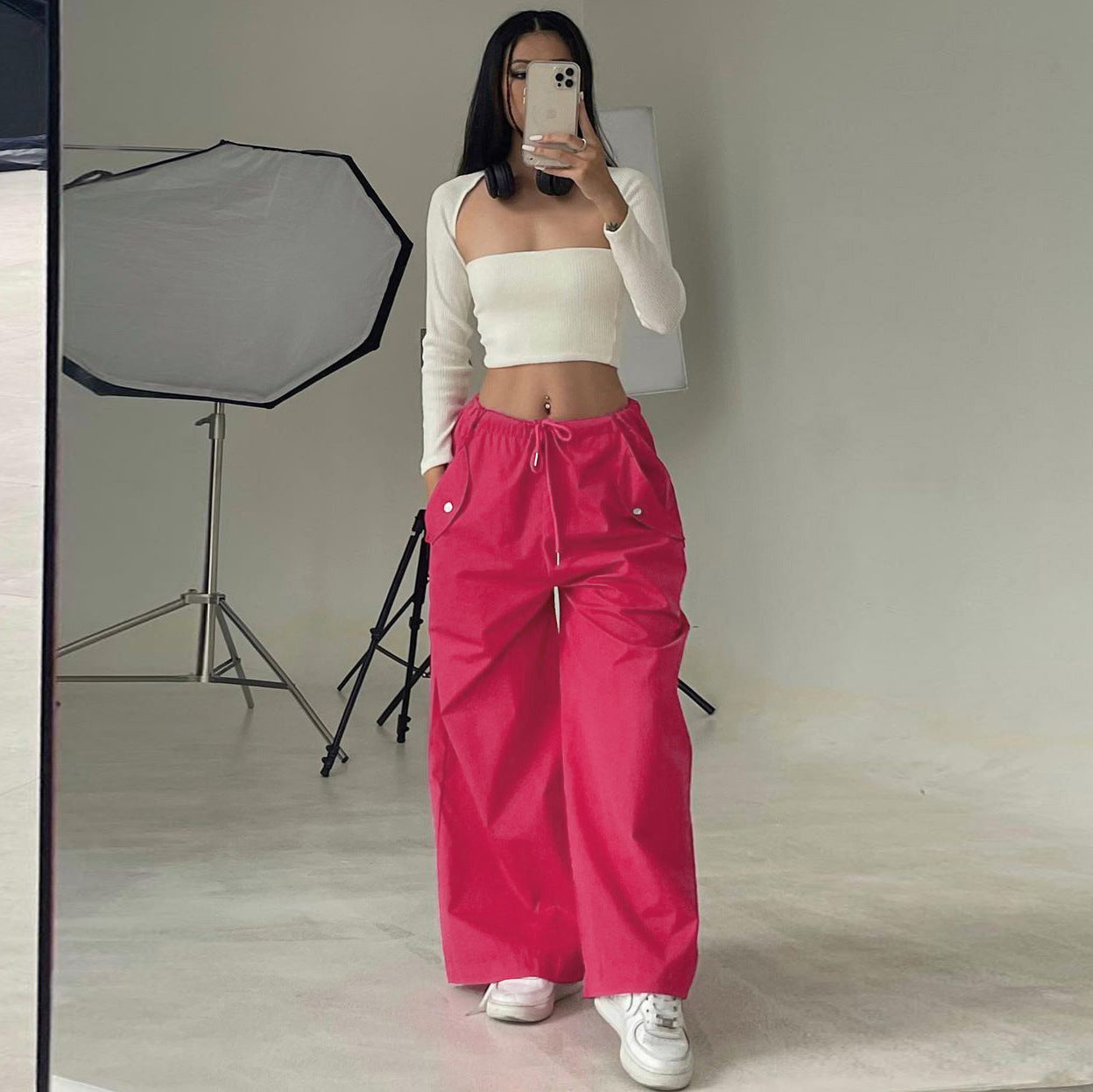 Women's high-waist lace-up straight-leg cargo pants in loose fit, casualwear by FitiqueFit, shown on a model.