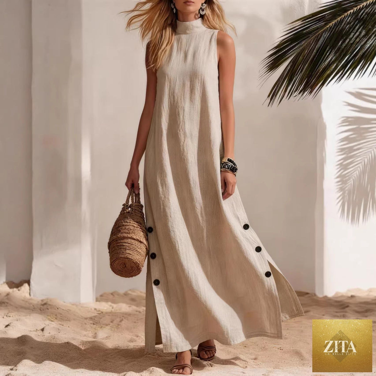 Light beige cotton linen sleeveless midi dress by FitiqueFit with side slits and a loose, relaxed fit, displayed on a hanger.
