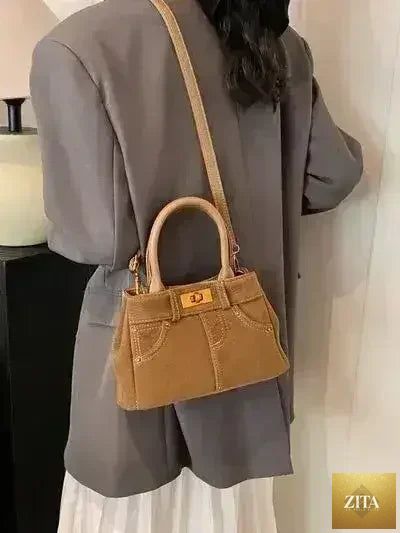 Femstylo stylish suede handbag with adjustable strap and dual-use design, featuring a chic and versatile bag for everyday use.