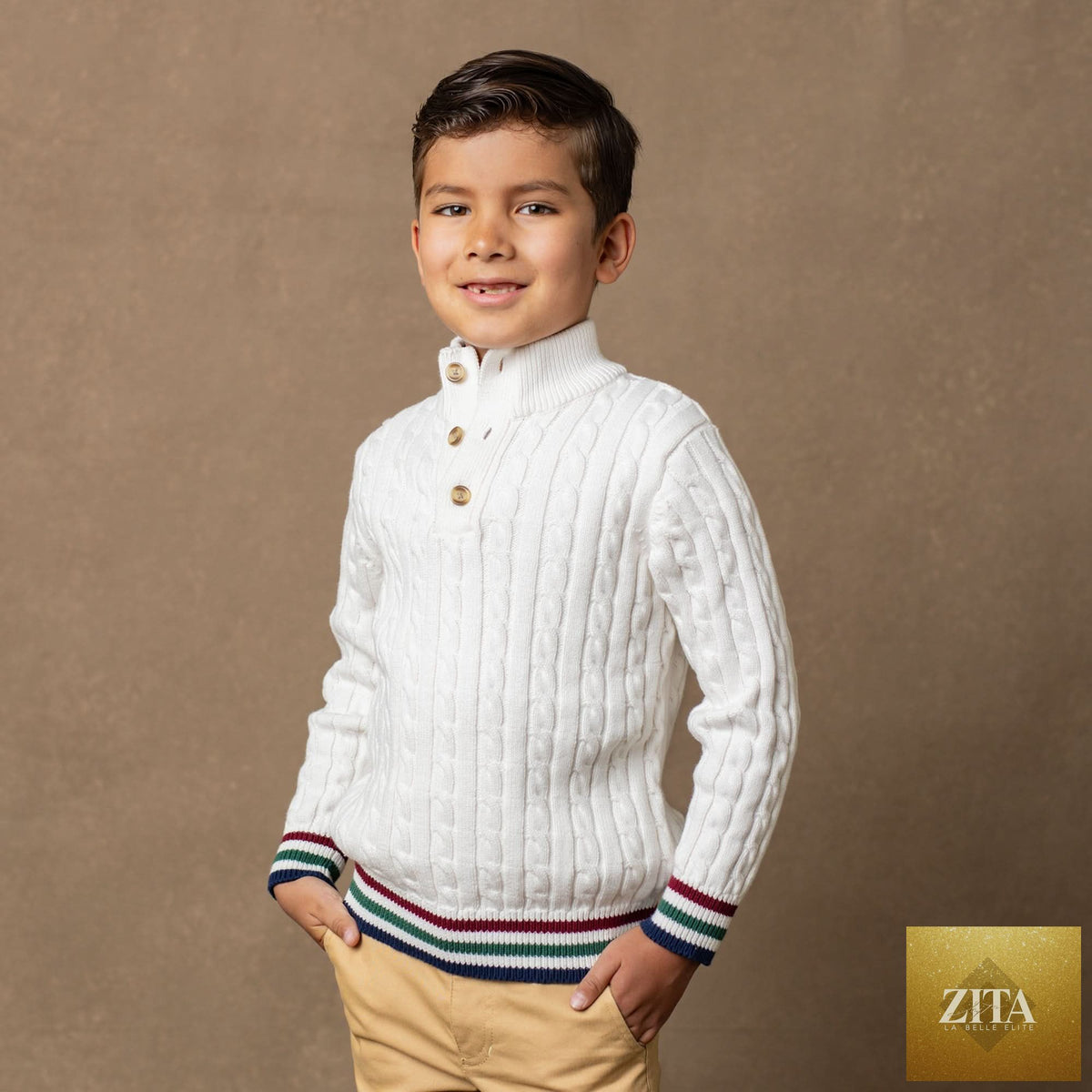 Baby organic mock neck cable sweater by Hope & Henry, featuring a cozy knit design and ribbed collar.