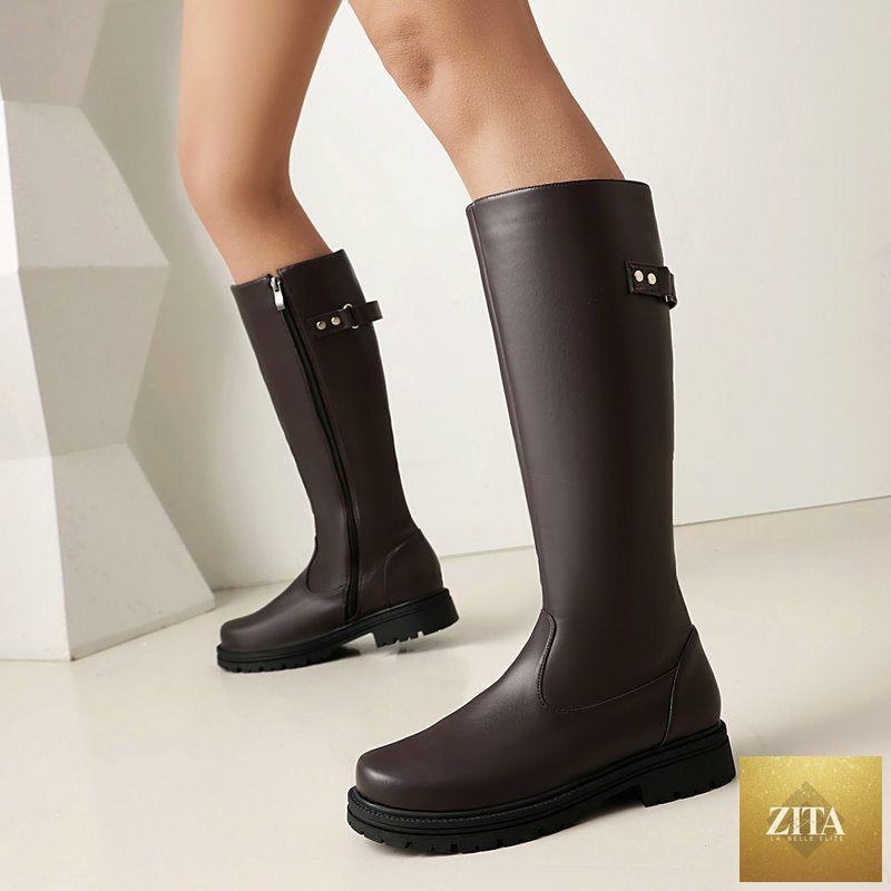 Women’s retro British-style riding boots by FitiqueFit, leather knee-high boots with belt buckle accents, stylish and durable footwear.